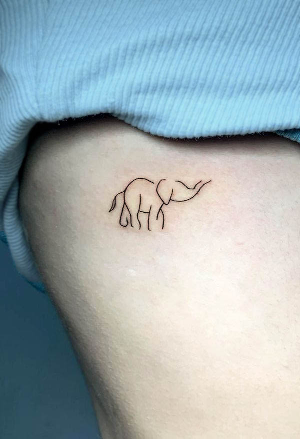 Simple elephant rib tattoo by @dado_ink93