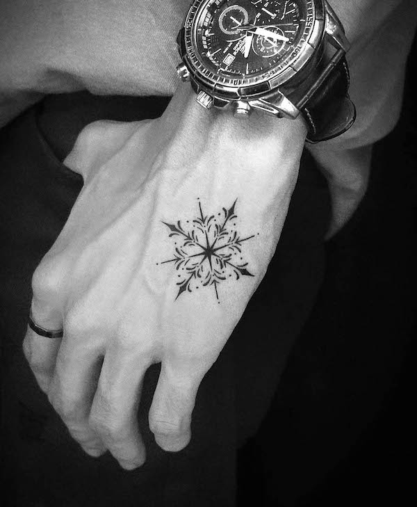 Simple snowflake mandala hand tattoo by @kraan9905