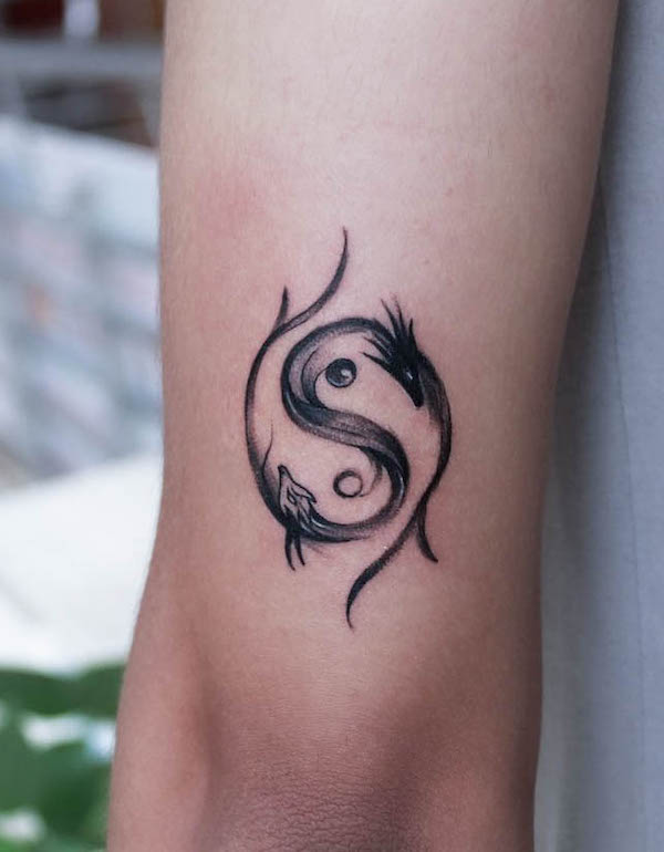 Simple yin yang dragon tattoo by @dhanushtattoo_ahmedabad