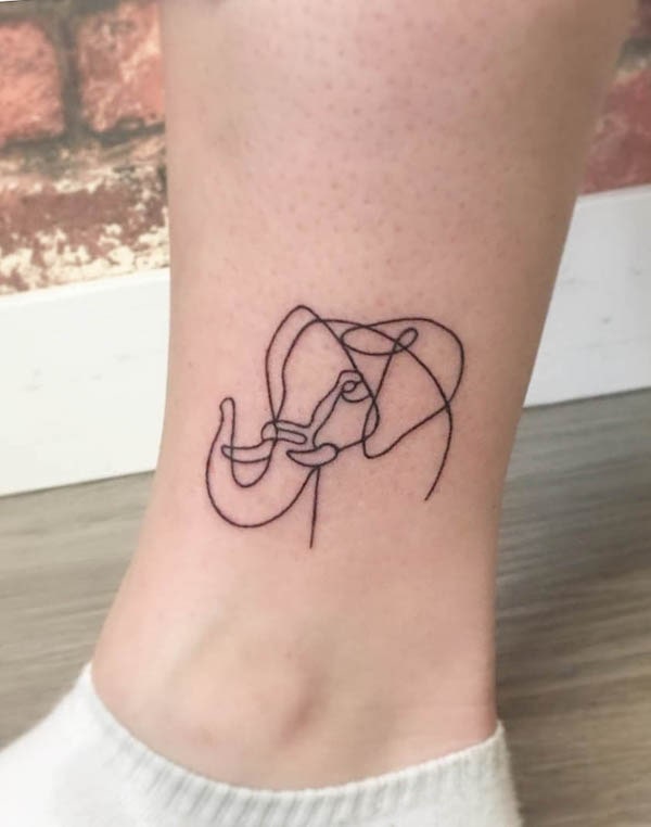 Single-line elephant tattoo by @sorrymumtattoos