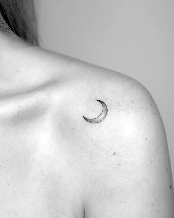 Small and simple moon tattoo by @halinczi