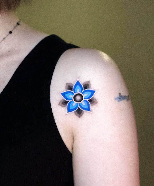 Small blue mandala tattoo by @kiwa_jip