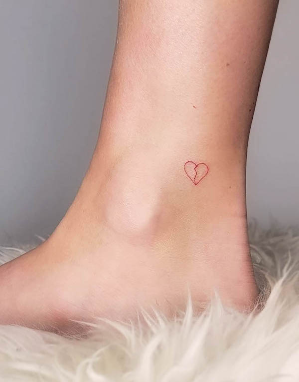 Small broken heart ankle tattoo by @ellie_s.tattoo