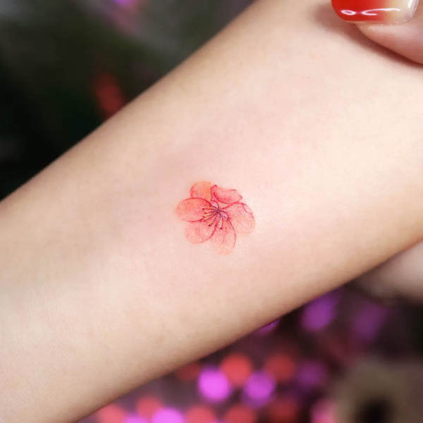 Small flower tattoo by @tattooist_namoo