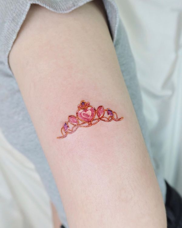 Small gemstone tiara tattoo by @mini.b_tats