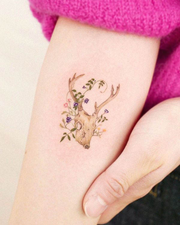 Small girly deer skull tattoo by @hansantattoo