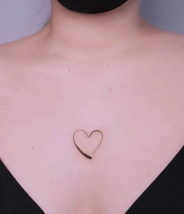 Small heart on the chest tattoo by @janapadar