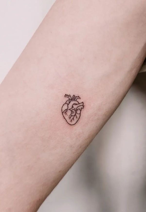 Small heart tattoo by @helentattootx