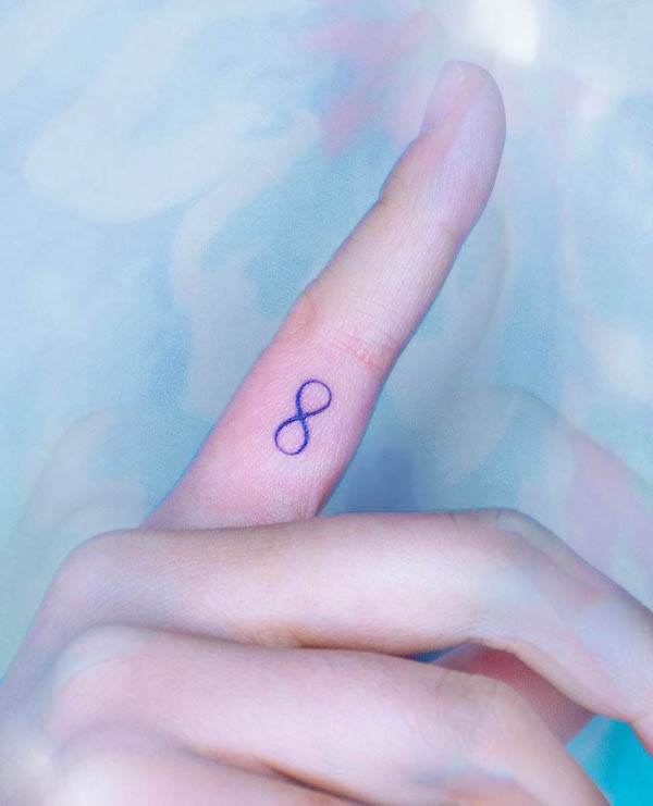 Small infinity symbol finger tattoo by @tattooist_chio