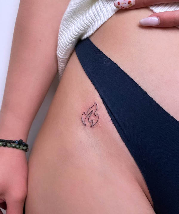 Small one-line fire tattoo on the hip by @percsydori