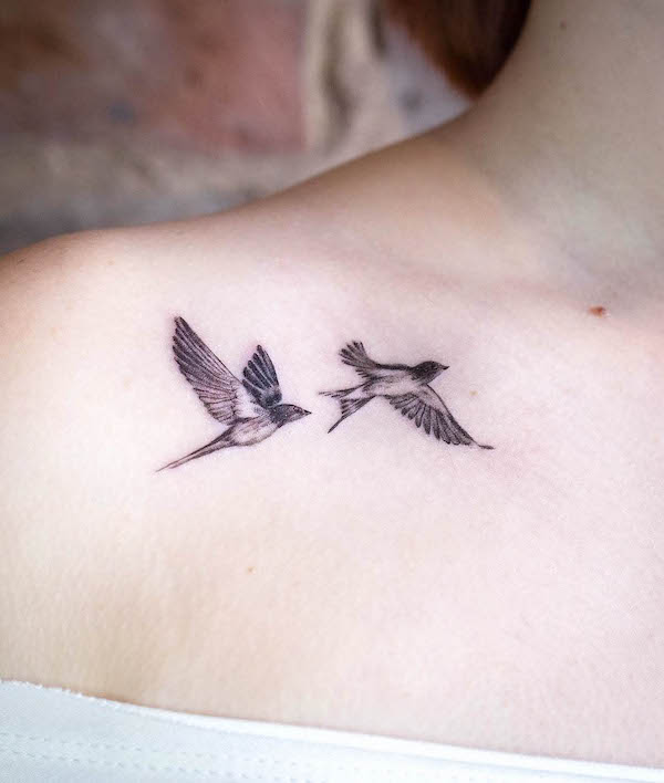 Small swallow tattoo on the collarbone by @meganbirdtattoo