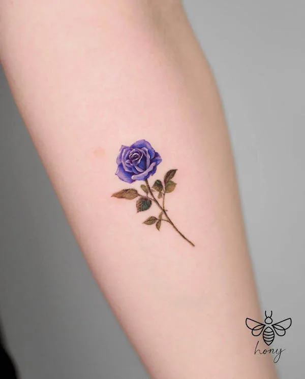 Small purple rose tattoo by @_hony_tattoo