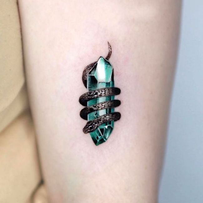 Snake and gemstone witchy tattoo by @tattooist_irae2