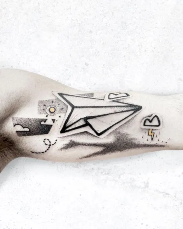 Stylish airplane sticker tattoo by @conio_polifamous