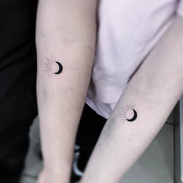 Sun and moon tattoo by @tattoopelikan