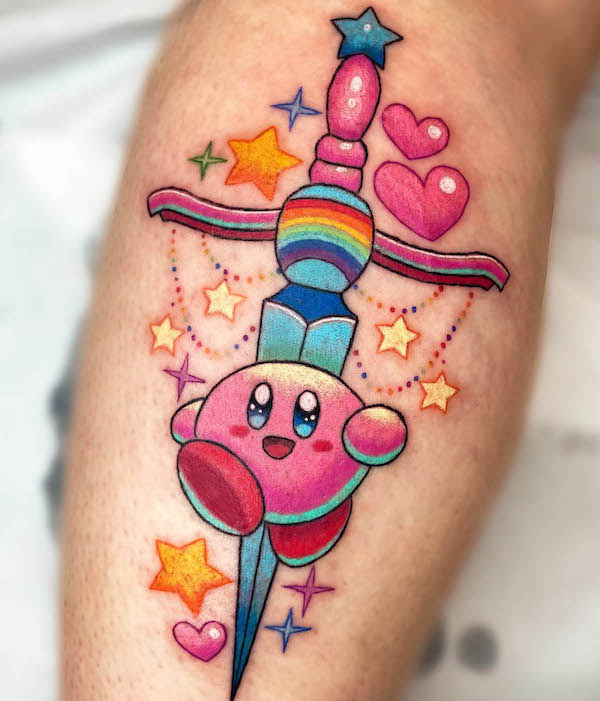 Super cute Kirby and dagger tattoo by @deadpan_anne_tattoo