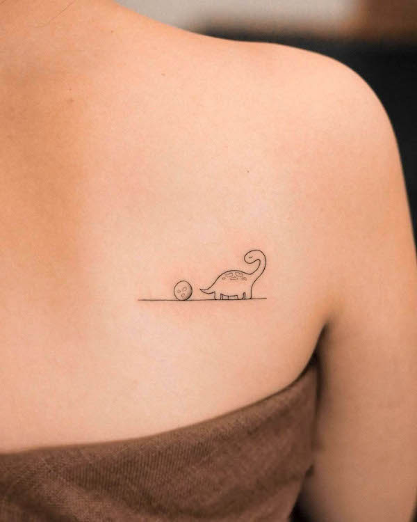 Super cute small dinosaur tattoo by @nhi.ink