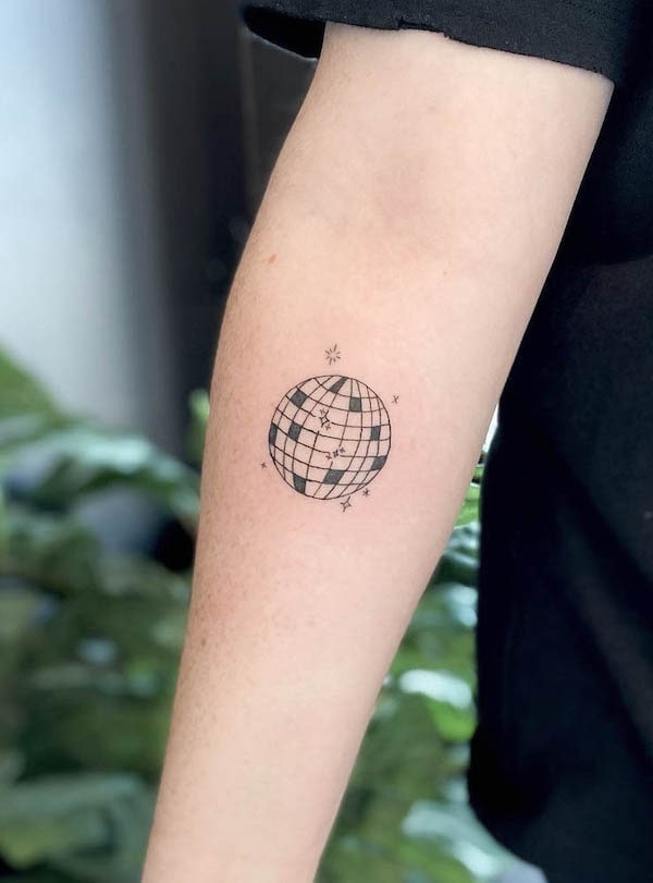 Super fun disco ball tattoo by @groovyyouink