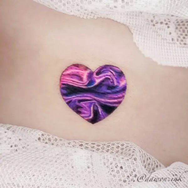 Swirl fantasy heart tattoo by @dawon.ink_