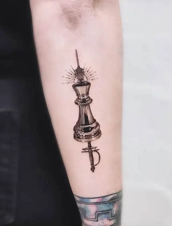 Sword and chess tattoo by @ik_tatz