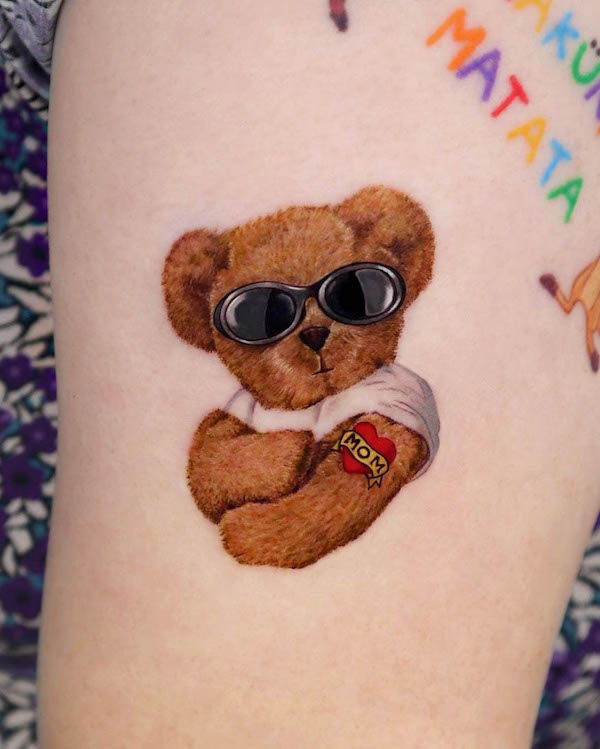 Teddy bear with a swag tattoo by @orot_tattoo