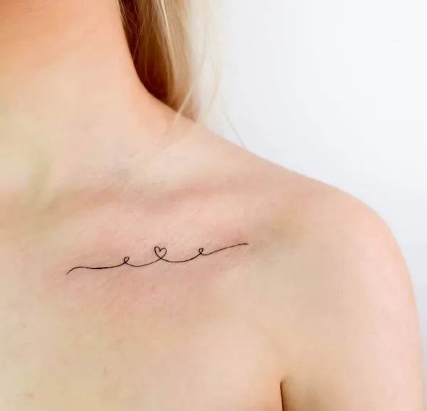 Tiny line and heart tattoo by @sointutattoo