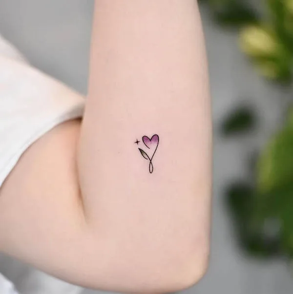 Tiny purple tattoo by @ye___ho