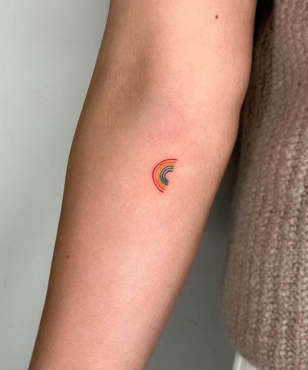 Tiny rainbow tattoo by @west4tattoo