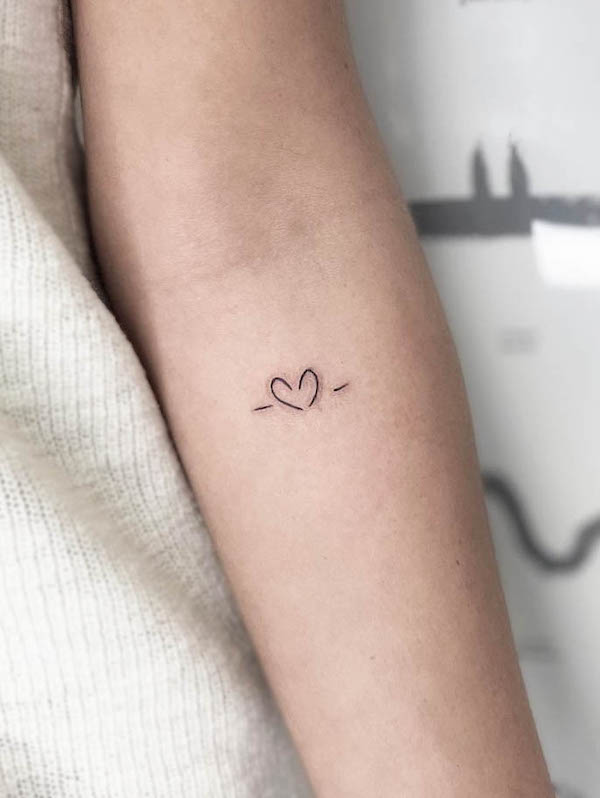 Tiny simple heart tattoo by @leorprice