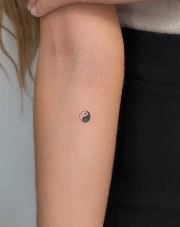 Tiny yin yang forearm tattoo by @muroxtattoo