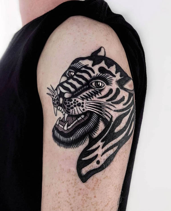 Traditional tiger tattoo by @dquinn.tattoo