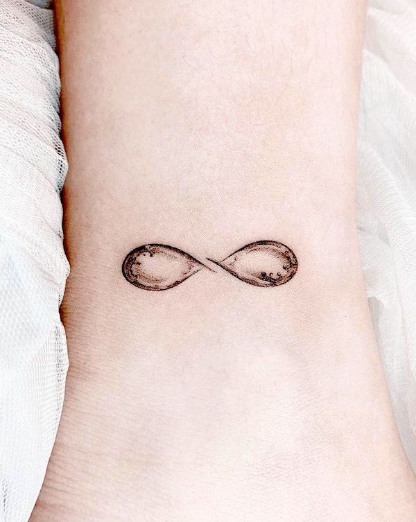 Water infinity symbol tattoo by @woonatattoo