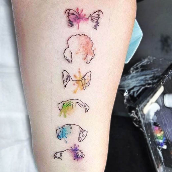 Watercolor dog ears tattoo by @kittenbasement