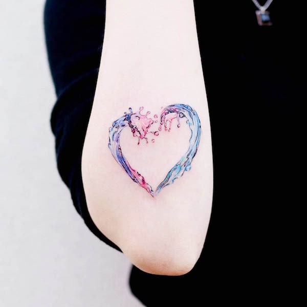 Watercolor heart shape tattoo by @guseul_tattoo