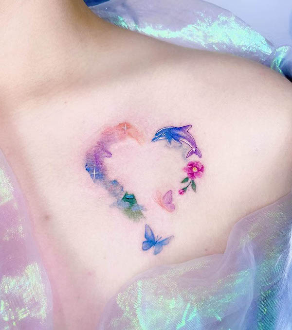 Watercolor heart tattoo with butterflies and dolphin by @plastic_tattoo