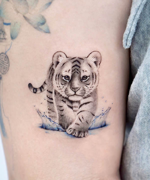 White tiger baby tattoo by @jannabi_tatt