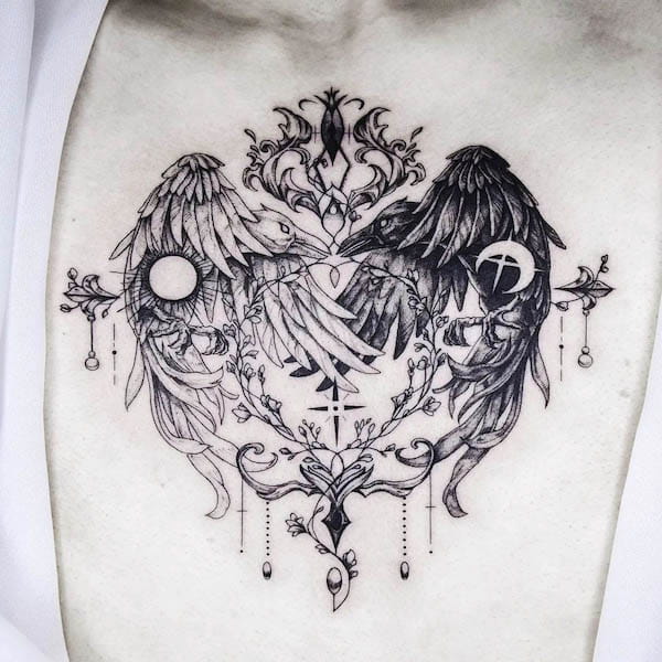 Yin yang raven chest tattoo by @nolgida.tattoo