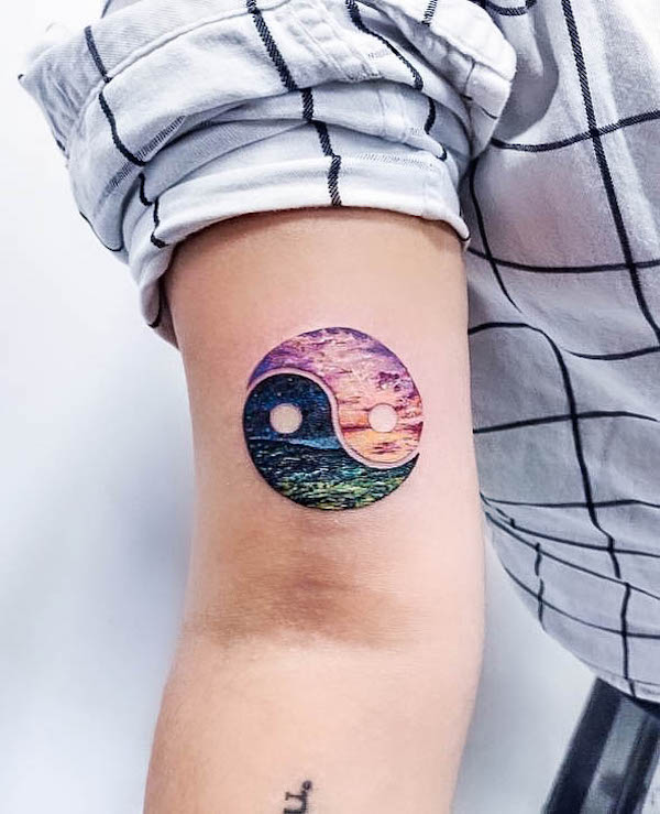 Yin yang seascape and sky tattoo by @eliteinkcollective