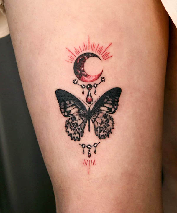 butterfly thigh tattoo by @tattooist_danha