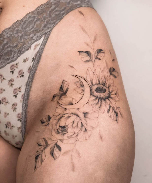 Sunflower hip and thigh tattoo by @bakken_tattoo