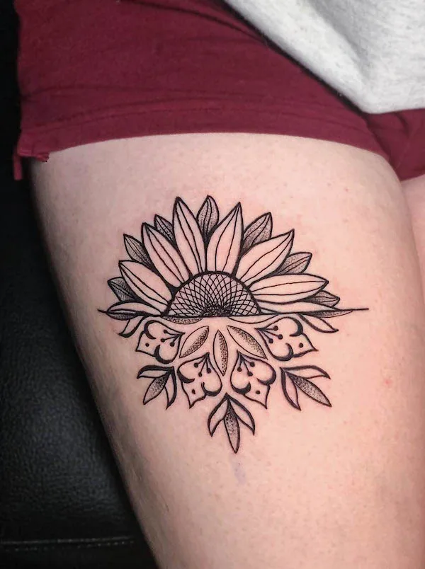 Sunflower thigh tattoo by @daveinks.88