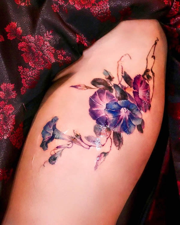 flower thigh tattoo by @seolheetattoo