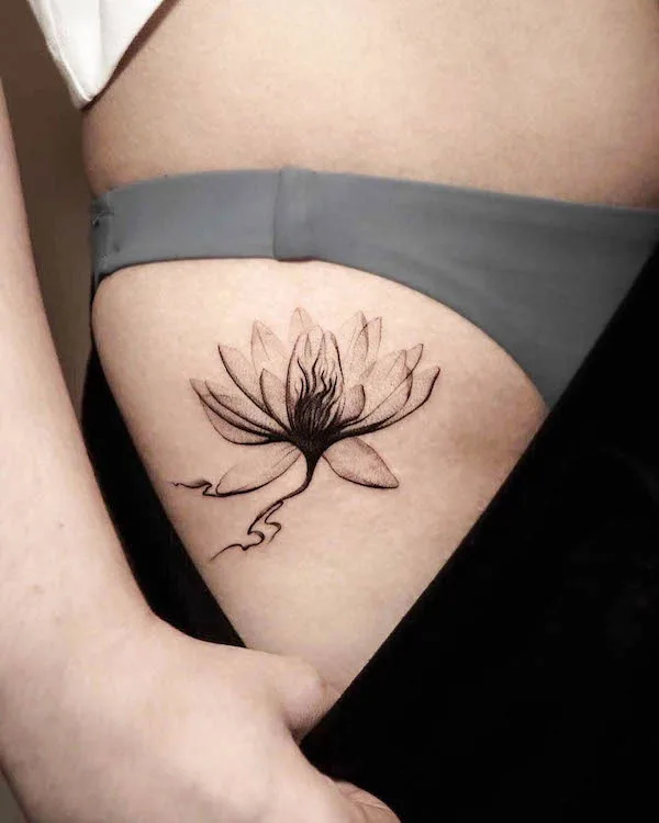 flower thigh tattoo by @vimanatattoostudio