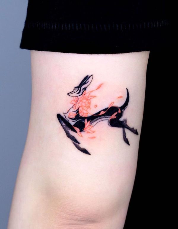 Flowers and deer tattoo by @bium_tattoo