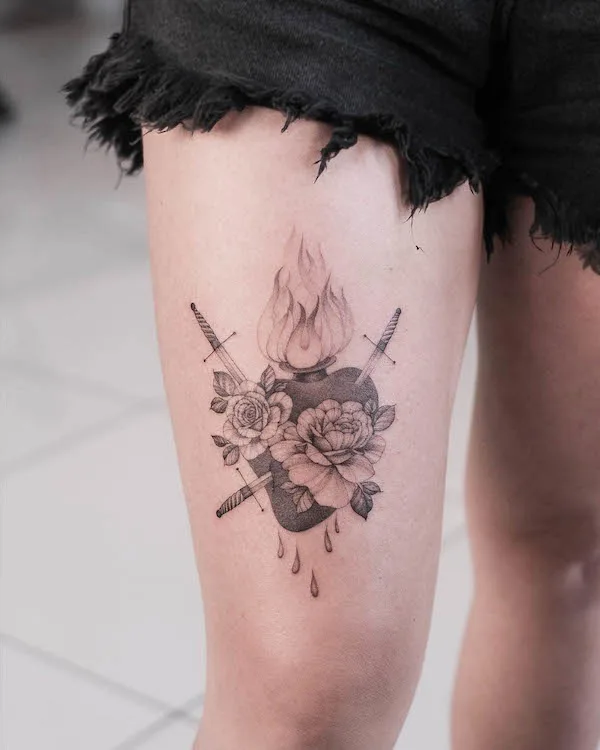 Burning heart by @sashatattooing