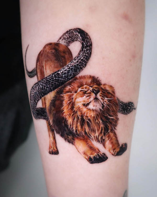 Lion and snake tattoo by @dusi.2