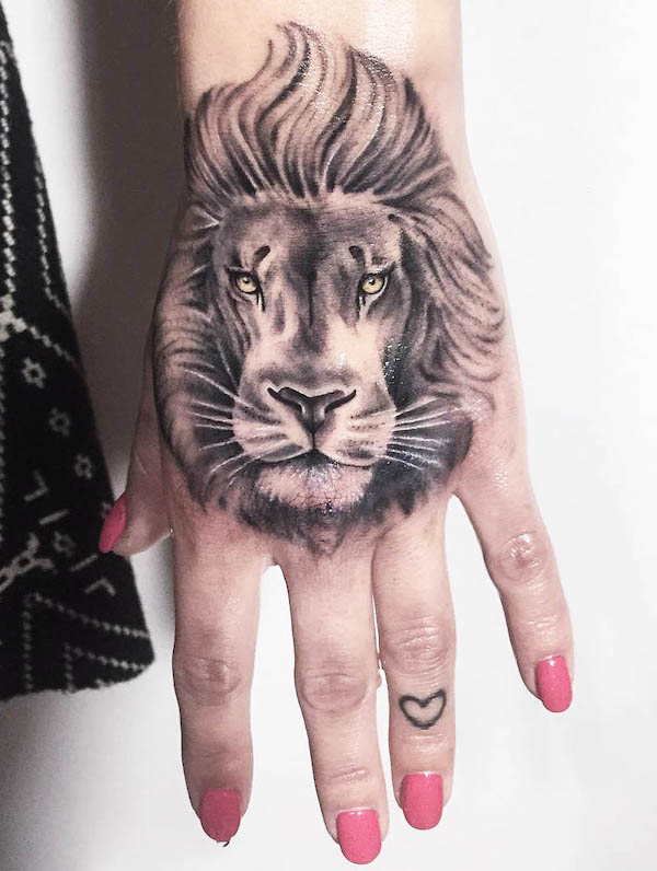 Lion hand tattoo by @mydeertattoo