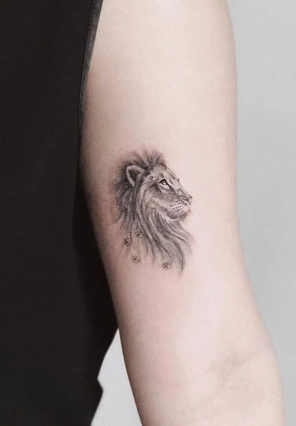 The silent power lion tattoo by @roma.ink