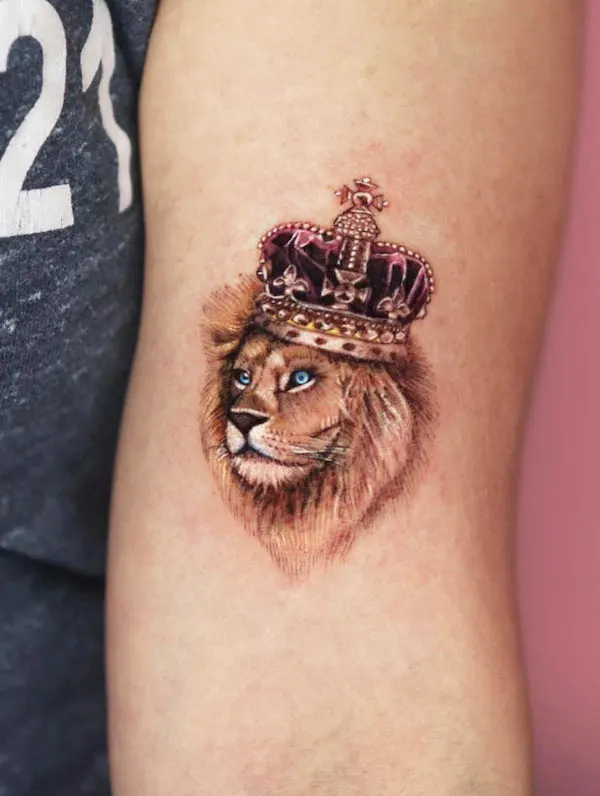 Lion with a crown tattoo by @studio_jaw