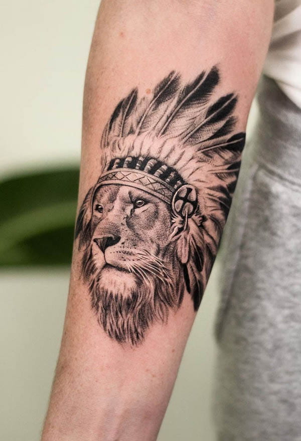 War bonnets lion tattoo by @y_m_tattoo